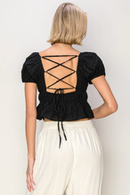 Load image into Gallery viewer, Textured Peplum Lace-Up Back Top - Black
